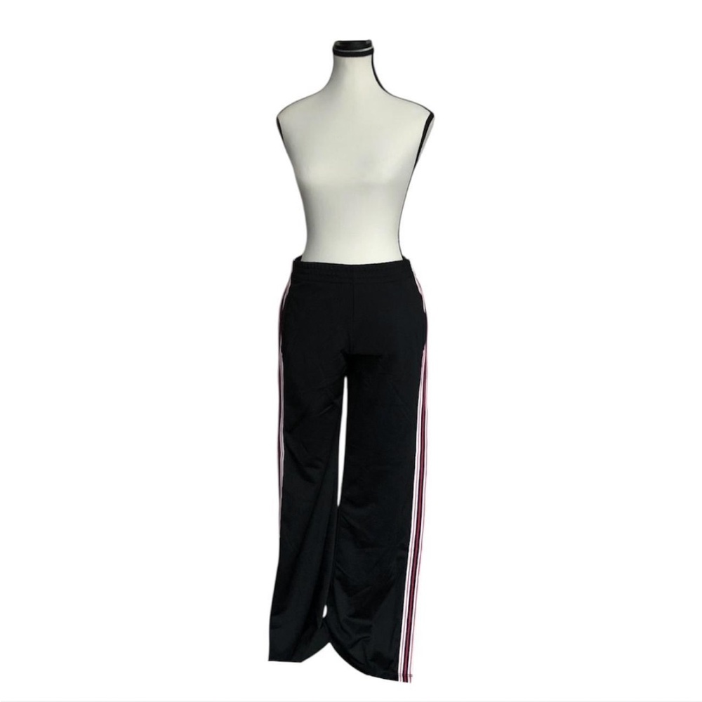 TNA Black Tearaway pants with Red and navy stripe